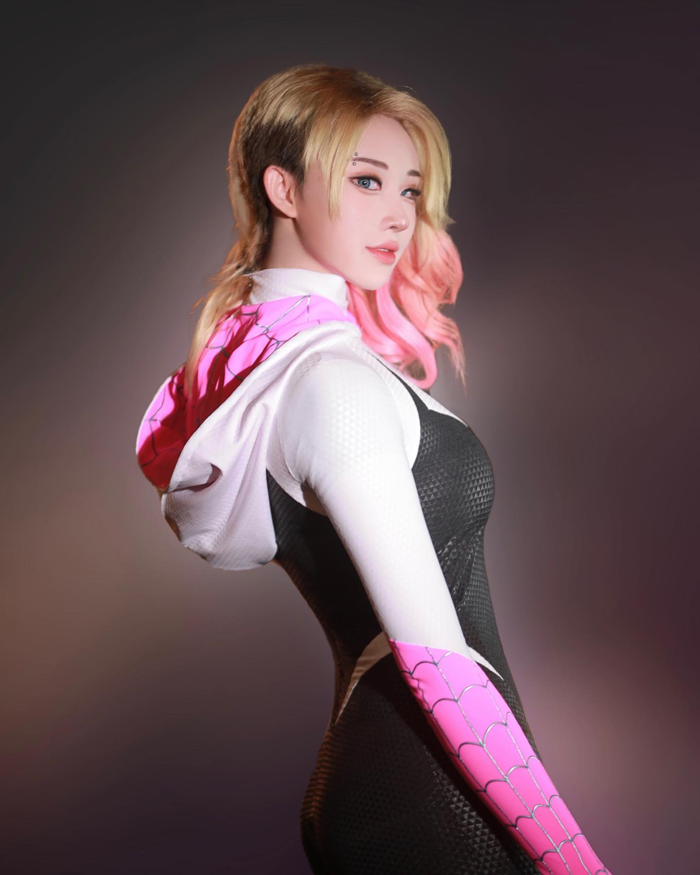 Adult and kids Spider Gwen costumes side by side Image